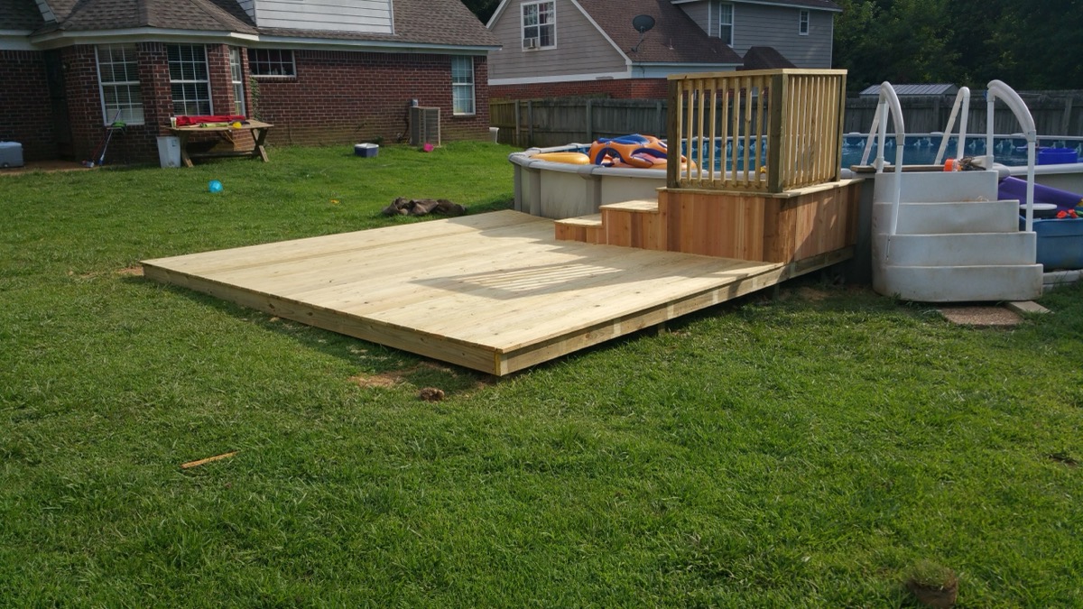 Wood deck platform and stairs for above-ground pool